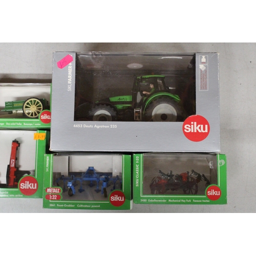 215 - FIVE SIKU 1:32 SCALE FARM MODELS TO INCLUDE A DEUTZ AGROTRON 235 TRACTOR, A MECHANICAL HAY FORK, A F... 