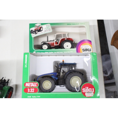 222 - THREE SIKU 1:32 SCALE TRACTOR MODELS TO INCLUDE A LIMITED EDITION FENDT 312 VARIO, A VALTRA T191 AND... 