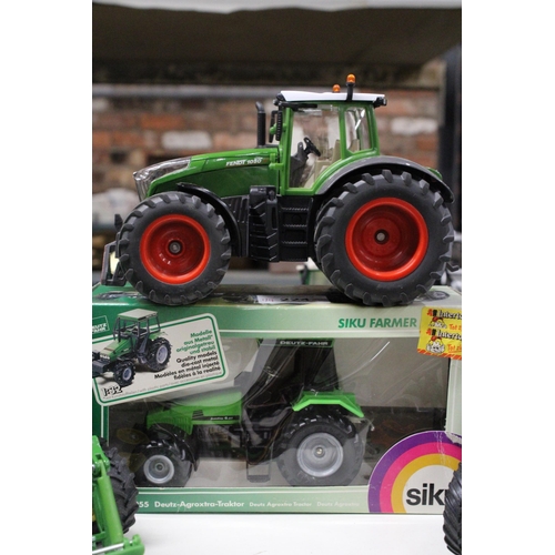 224 - FOUR SIKU 1:32 SCALE TRACTOR MODELS TO INCLUDE A DEUTZ AGROXTRA (AS NEW IN BOX), A FENDT 1050, A JOH... 