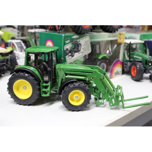 224 - FOUR SIKU 1:32 SCALE TRACTOR MODELS TO INCLUDE A DEUTZ AGROXTRA (AS NEW IN BOX), A FENDT 1050, A JOH... 