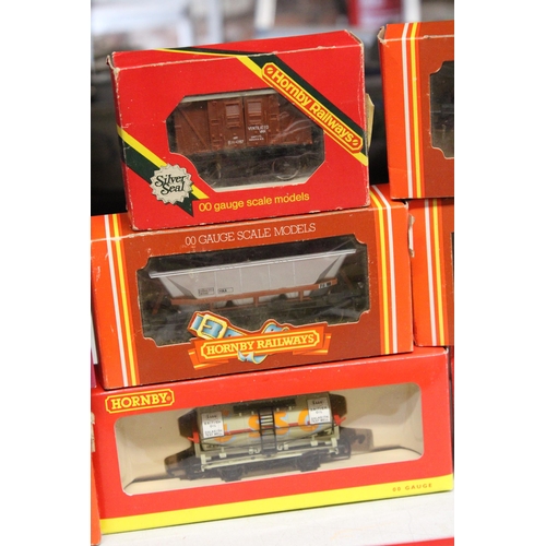 244 - EIGHT HORNBY OO GAUGE MODEL ROLLING STOCK TO INCLUDE BR VENTILATED VAN, FOUR MERRY-GO-ROUND HOPPER W... 