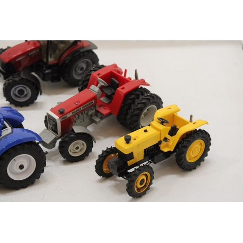 501 - SIX BRITAINS MODEL TRACTORS TO INCLUDE A FIAT, A DX 92, A YELLOW TRACTOR, A CASE 110, A FORD NEW HOL... 