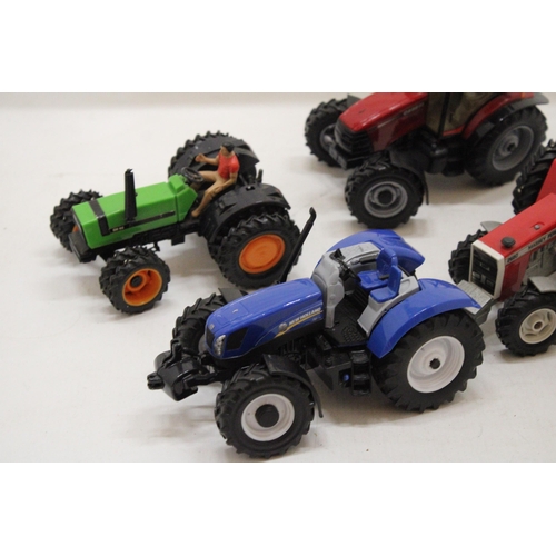 501 - SIX BRITAINS MODEL TRACTORS TO INCLUDE A FIAT, A DX 92, A YELLOW TRACTOR, A CASE 110, A FORD NEW HOL... 