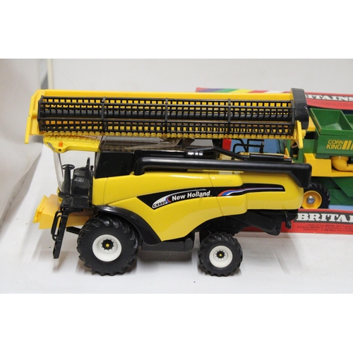 506 - TWO BRITAINS 1:32 SCALE MODELS TO INCLUDE A COMBINE HARVESTER WITH MAIZE HEAD - AS NEW IN BOX AND A ... 