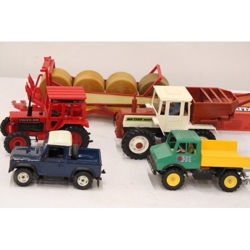 518 - SEVEN ITEMS OF BRITAINS FARMYARD VEHICLES AND ACCESSORIES TO INCLUDE A VOLVO BM TRACTOR, A MERCEDES ... 