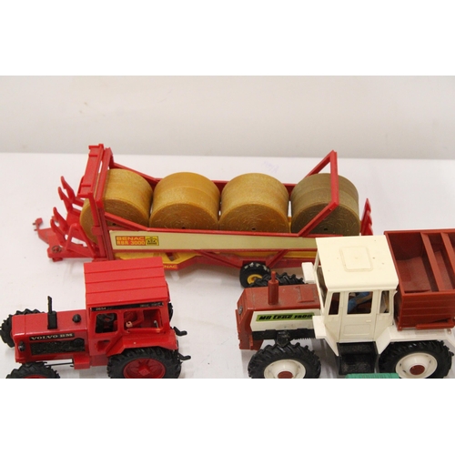 518 - SEVEN ITEMS OF BRITAINS FARMYARD VEHICLES AND ACCESSORIES TO INCLUDE A VOLVO BM TRACTOR, A MERCEDES ... 