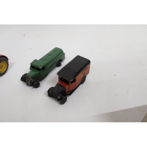 593 - FOUR VINTAGE DINKY TOYS TO INCLUDE A MUIR-HILL DUMPER, AMASSEY-HARRIS TRACTOR, A ROYAL MAIL VAN AND ... 