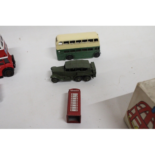 594 - THREE VINTAGE DINKY TOYS TO INCLUDE A DOUBLE DECKER BUS, A MILITARY 6 WHEELED RECONNAISSANCE CAR, A ... 