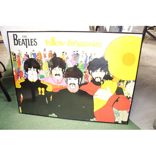 81 - A LARGE FRAMED POSTER OF THE BEATLES 