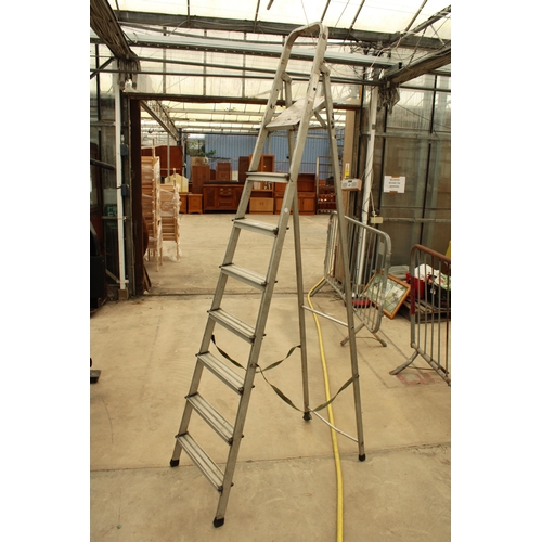 A SEVEN RUNG ALUMINIUM STEP LADDER