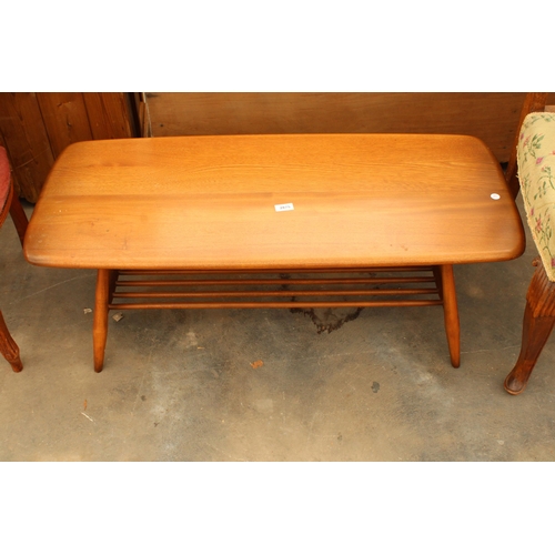 2875 - AN ERCOL COFFEE TABLE WITH MAGAZINE SHELF 40