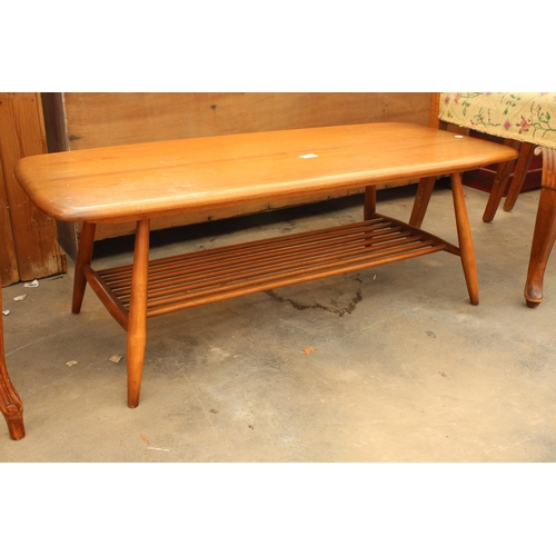 2875 - AN ERCOL COFFEE TABLE WITH MAGAZINE SHELF 40