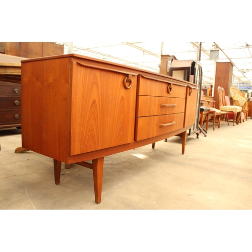 2880 - A RETRO TEAK BEAUTILITY SIDEBOARD ENCLOSING THREE DRAWERS AND TWO CUPBOARDS 72