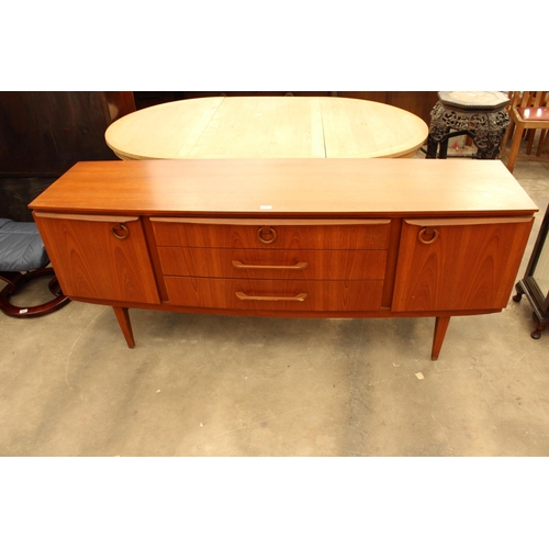 2880 - A RETRO TEAK BEAUTILITY SIDEBOARD ENCLOSING THREE DRAWERS AND TWO CUPBOARDS 72