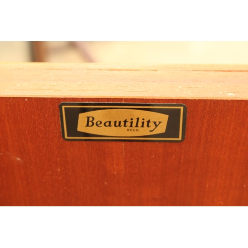 2880 - A RETRO TEAK BEAUTILITY SIDEBOARD ENCLOSING THREE DRAWERS AND TWO CUPBOARDS 72