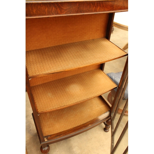 2882 - AN EARLY 20TH CENTURY OAK CHINA CUPBOARD ON OPEN BASE WITH BULBOUS FRONT LEGS 26.5