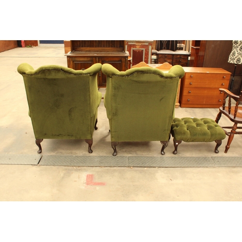 2889 - A PAIR OF GREEN BUTTON BACK WINGED FIRESIDE CHAIRS ON CABRIOLE LEGS AND STOOL