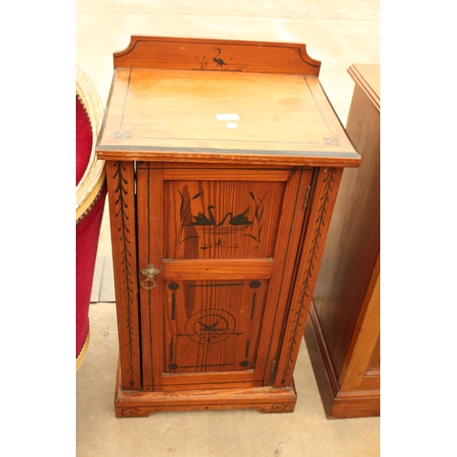 2895 - A VICTORIAN PITCH PINE POT CUPBOARD WITH BLACK PAINTED SCENES DEPICTING SWANS