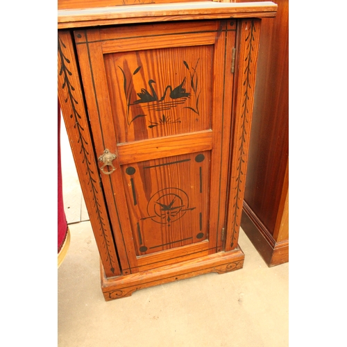 2895 - A VICTORIAN PITCH PINE POT CUPBOARD WITH BLACK PAINTED SCENES DEPICTING SWANS