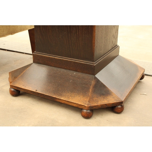 2898 - AN OAK ART DECO CENTRE TABLE DECORATED WITH SWAGS, 38 X 26