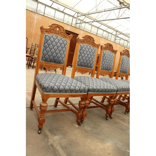 2902 - A SET OF SIX OAK LATE VICTORIAN DINING CHAIRS WITH CARVED TOP RAILS AND TURNED FRONT LEGS