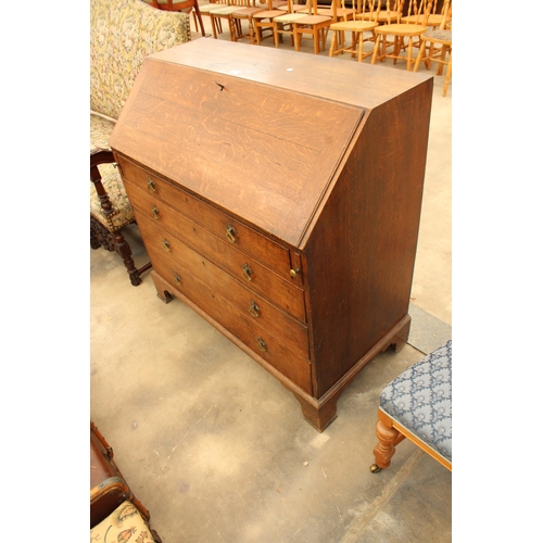 2903 - AN OAK GEORGE III BUREAU WITH FITTED INTERIOR, FOUR GRADUATED DRAWERS AND BRACKET FEET, 42.5