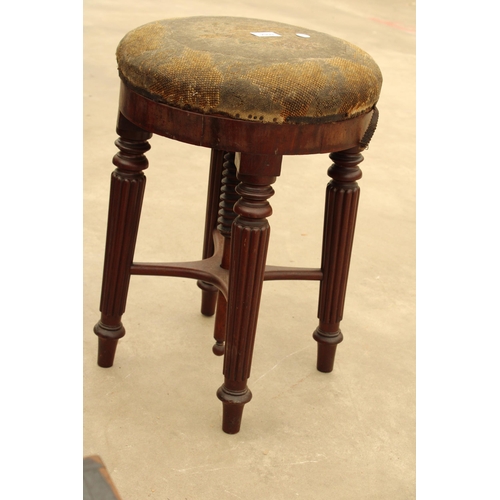 2909 - A VICTORIAN MAHOGANY ADJUSTABLE PIANO STOOL ON TURNED AND FLUTED LEGS