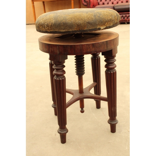 2909 - A VICTORIAN MAHOGANY ADJUSTABLE PIANO STOOL ON TURNED AND FLUTED LEGS