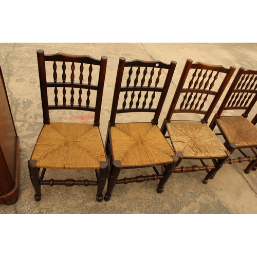 2918 - EIGHT GEORGE III HARLEQUIN LANCASHIRE SPINDLE BACK DINING CHAIRS WITH RUSH SEATS