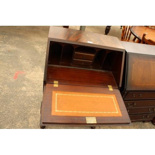 2923 - A MODERN MAHOGANY AND INLAID BUREAU ON CABRIOLE LEGS, 24