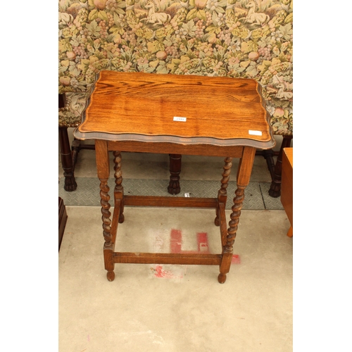 2944 - AN EARLY 20TH CENTURY OAK- BARLEY TWIST OCCASIONAL TABLE , 23