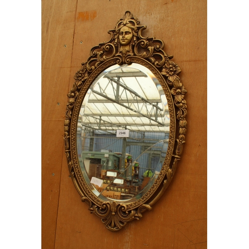 2946 - A MODERN F-111 DESIGNED ITALIAN BRASS WALL MIRROR, 20