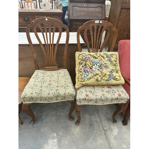 2874 - A PAIR OF MAHOGANY HEPPLEWHITE STYLE DINING CHAIRS WITH WOOLWORK SEATS AND ONE CUSHION