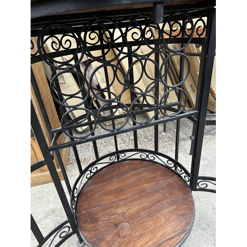 2949 - A CIRCULAR WINE RACK TABLE WITH HARDWOOD TOP AND BASE