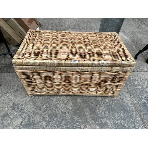 2951 - A WICKER LAUNDRY BASKET