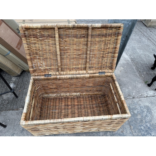 2951 - A WICKER LAUNDRY BASKET