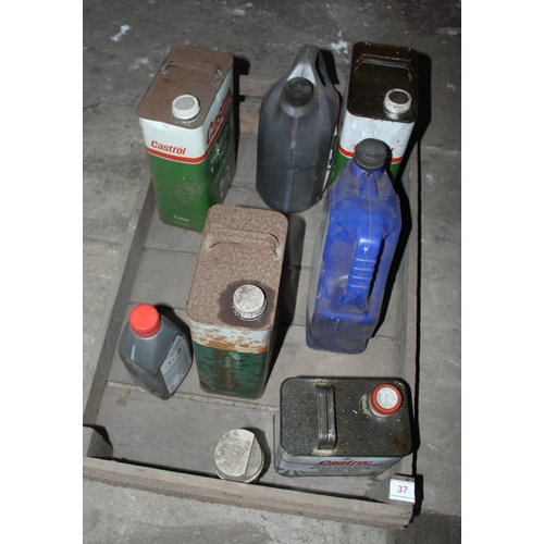 37 - SPRITTING BOX OF 6 FUEL & OIL CANS  + VAT