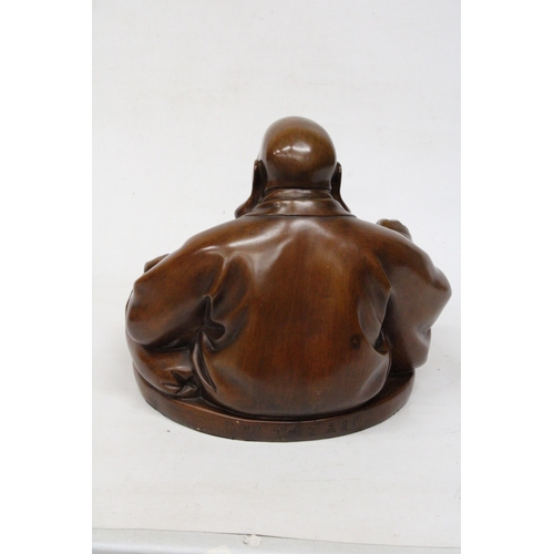 20 - A WOOD SCULPTURE OF A  LARGE LAUGHING BUDDHA