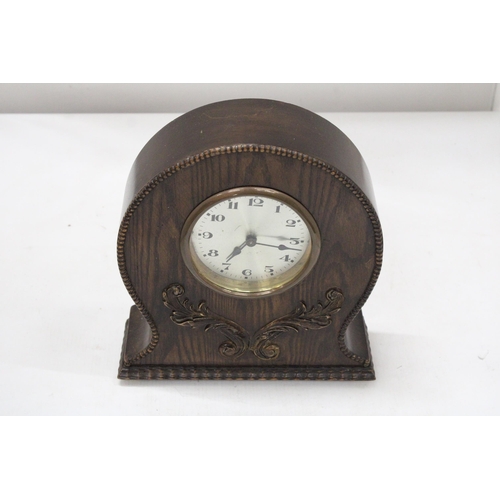 27 - AN ART DECO EIGHT DAY WOODEN MANTLE CLOCK