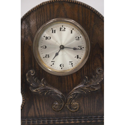 27 - AN ART DECO EIGHT DAY WOODEN MANTLE CLOCK