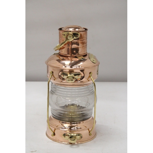 41 - A VINTAGE NAUTICAL BRASS AND COPPER ANCHOR OIL LAMP