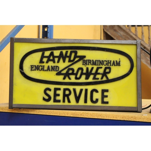 52 - AN ILLUMINATED LAND ROVER BIRMINGHAM ENGLAND SERVICE SIGN - 52 X 28 CM