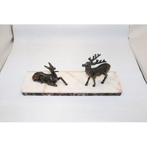 69 - AN ART DECO PAIR OF STAGS ON A MARBLE BASE