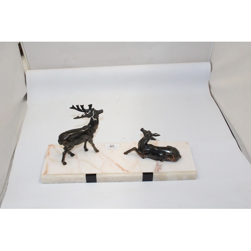 69 - AN ART DECO PAIR OF STAGS ON A MARBLE BASE