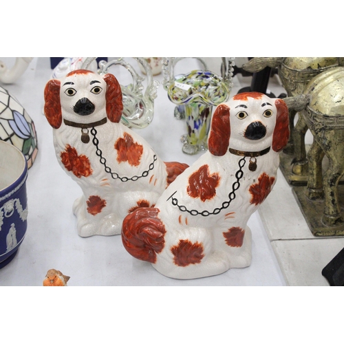 138 - A PAIR OF VINTAGE STAFFORDSHIRE DOGS