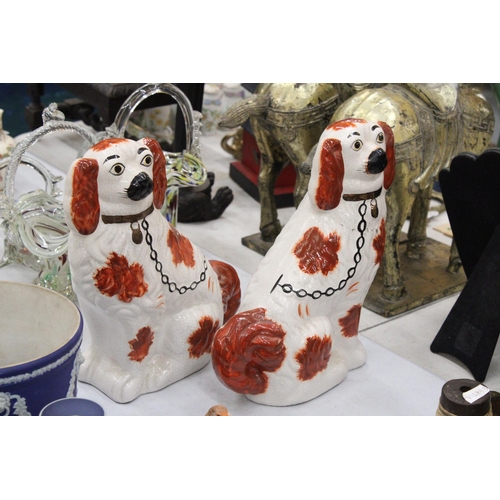 138 - A PAIR OF VINTAGE STAFFORDSHIRE DOGS