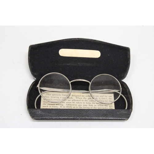 153 - A PAIR OF WORLD WAR II SPECTACLES IN A CASE