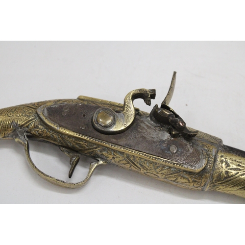 170 - A HEAVY BRASS ORNAMENTAL FLINTLOCK PISTOL