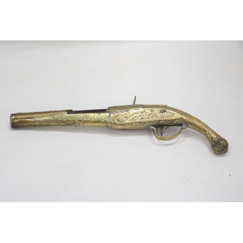 170 - A HEAVY BRASS ORNAMENTAL FLINTLOCK PISTOL