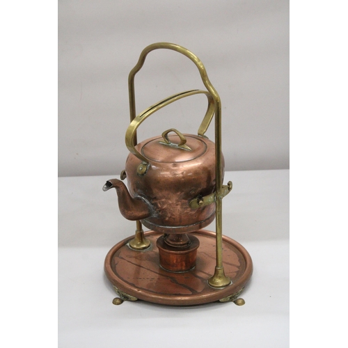 185 - A COPPER GAS PIVOT KETTLE